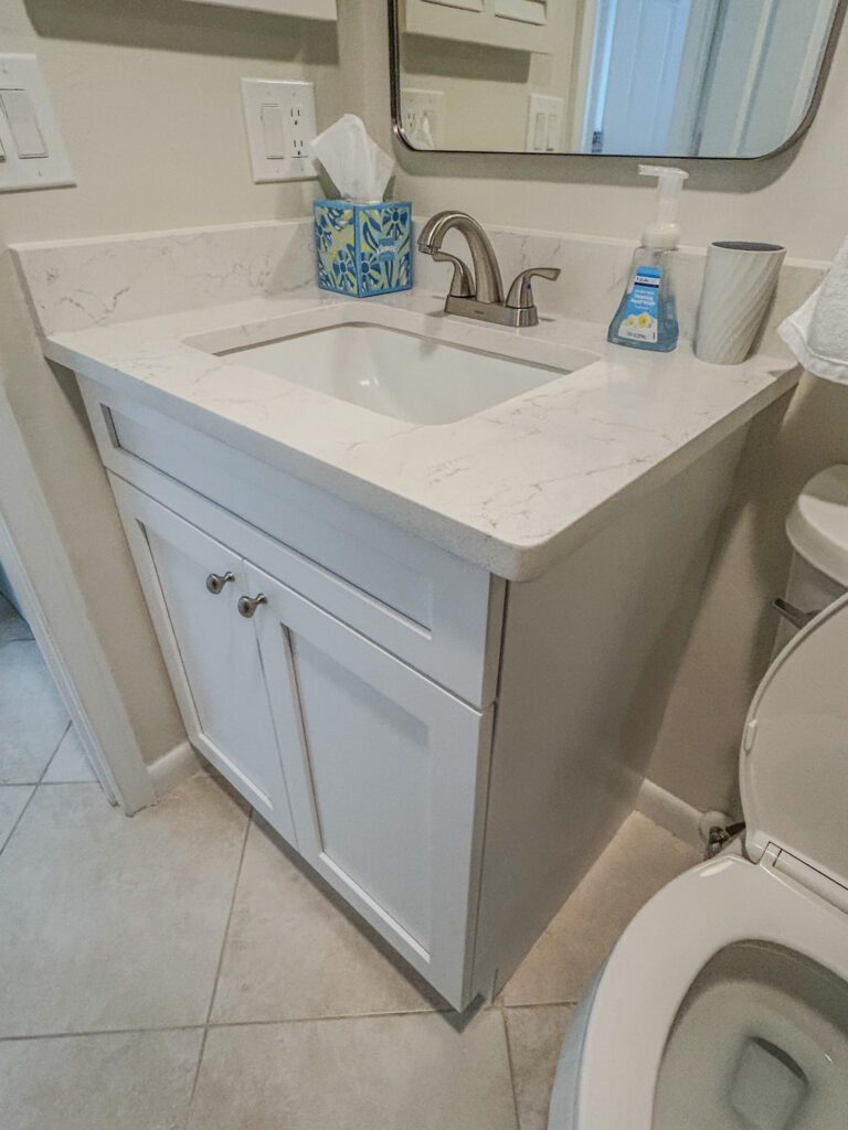 After image of remodeled bathroom vanity installed by bathroom renovation contractors in Southwest Missouri | Sun Control Aluminum & Remodelin