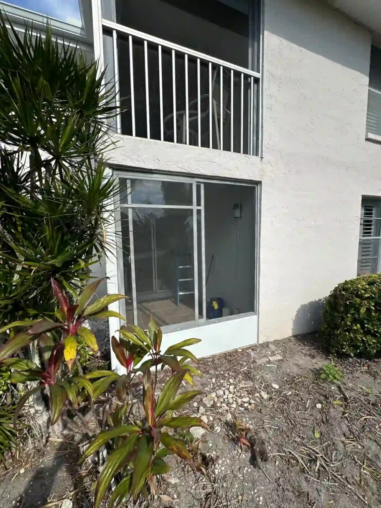 Florida lanai with acrylic window inserts and rescreened windows. | Sun Control Aluminum & Remodeling